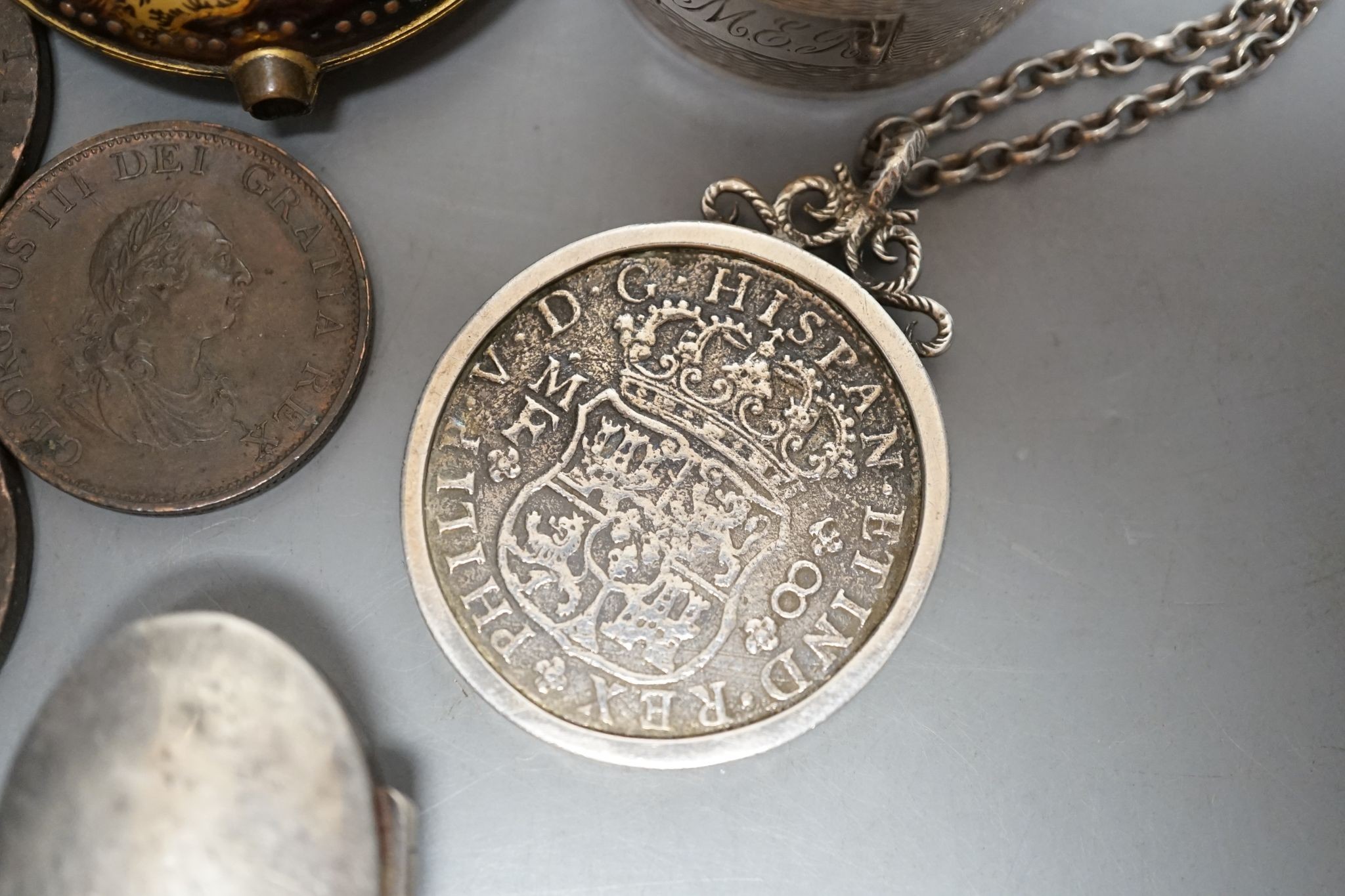 A Philip V 8 Reale coin pendant mounted, assorted 18th century and later coinage, faux tortoiseshell watch case and sundries